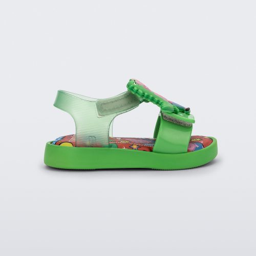 Side view of a green Jump + Peppa Pig baby sandal