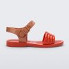 Side view of a red Mar Wave kids sandal with brown strap.