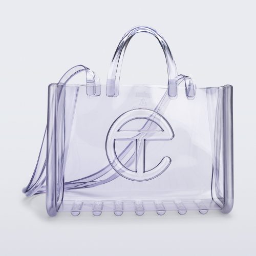 Angled view of the clear Large Jelly Shopper x Telfar bag