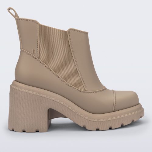 Side view of a beige Courtney boot