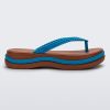 Side view of a brown/blue Melissa Leblon platform flip flop with details that mimic sisal braids on the sole and strap