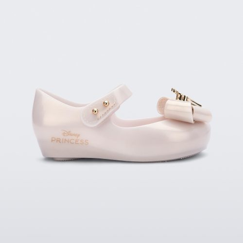 Side view of a metallic beige baby Ultragirl Princess Flat