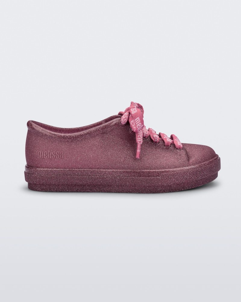 Side view of a glitter pink Hip M Lover kids sneaker with laces.