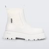 Side view of a white Drip Boot