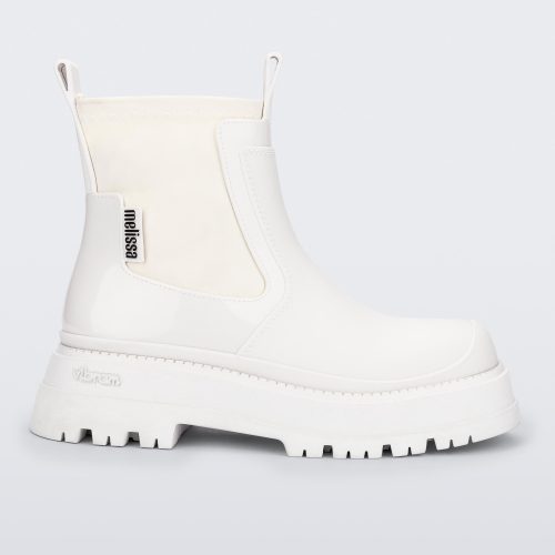 Side view of a white Drip Boot