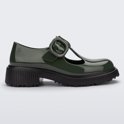 Side view of a Green Mini Melissa Jackie loafer with a green base, two cut outs, a green buckle detail strap and black sole.