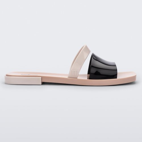 Side view of a black and beige Ivy women's slide