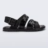 Side view of a black Lock Sandal with back strap