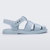 Side view of a blue Emma women's sandal.