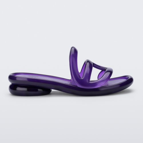 Side view of a purple Jelly Slide x Telfar.