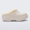 Side view of a beige Free Clog Fluffy Platform with light beige fluffy liner