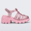 Side view of a glitter pink Megan kids heel sandal.