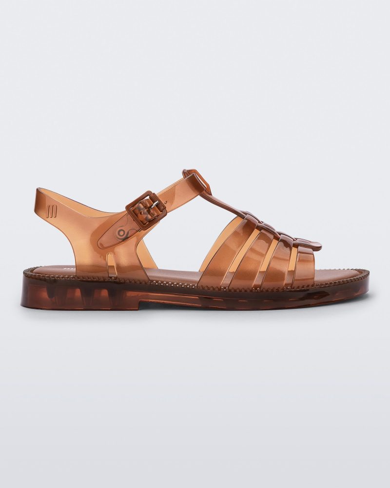 Side view of a transparent brown Possession Fresh fisherman style sandal with open toe