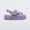 Side view of a lilac glitter Mini Melissa Cozy sandal with with two front straps with buckle detail