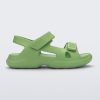 Side view of a green Free Papete sandal