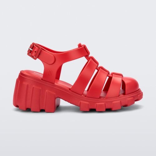 Side view of a red kids Megan heeled sandal