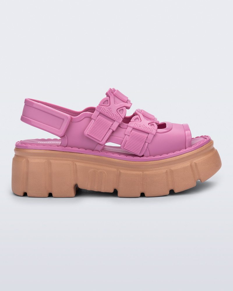 Side view of a pink Rebel platform Sandal with back strap