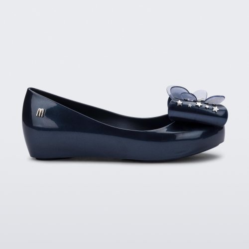 Side view of a Mini Melissa Ultragirl peeptoe ballet flat in blue with star printed butterfly bow applique. 