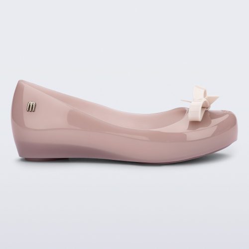 Side view of a pink kids Ultragirl Bow flat