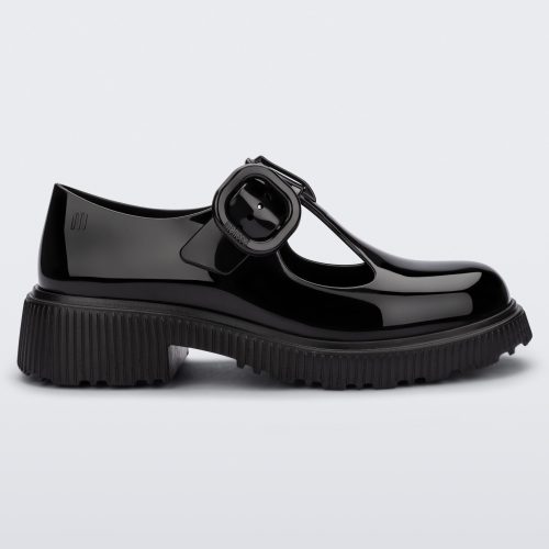 Side view of a black Melissa Jackie loafer with two cut outs and a buckle detail strap.