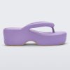 Side view of a Melissa Free platform flip flop in lilac with tan sole