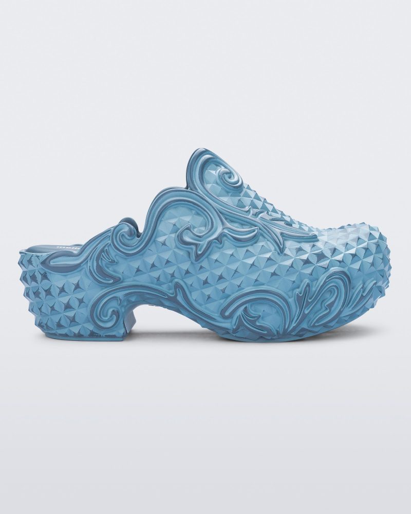 Side view of a blue Court Clog + Y/Project platform clog