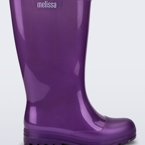 Side view of a purple Welly rainboot.