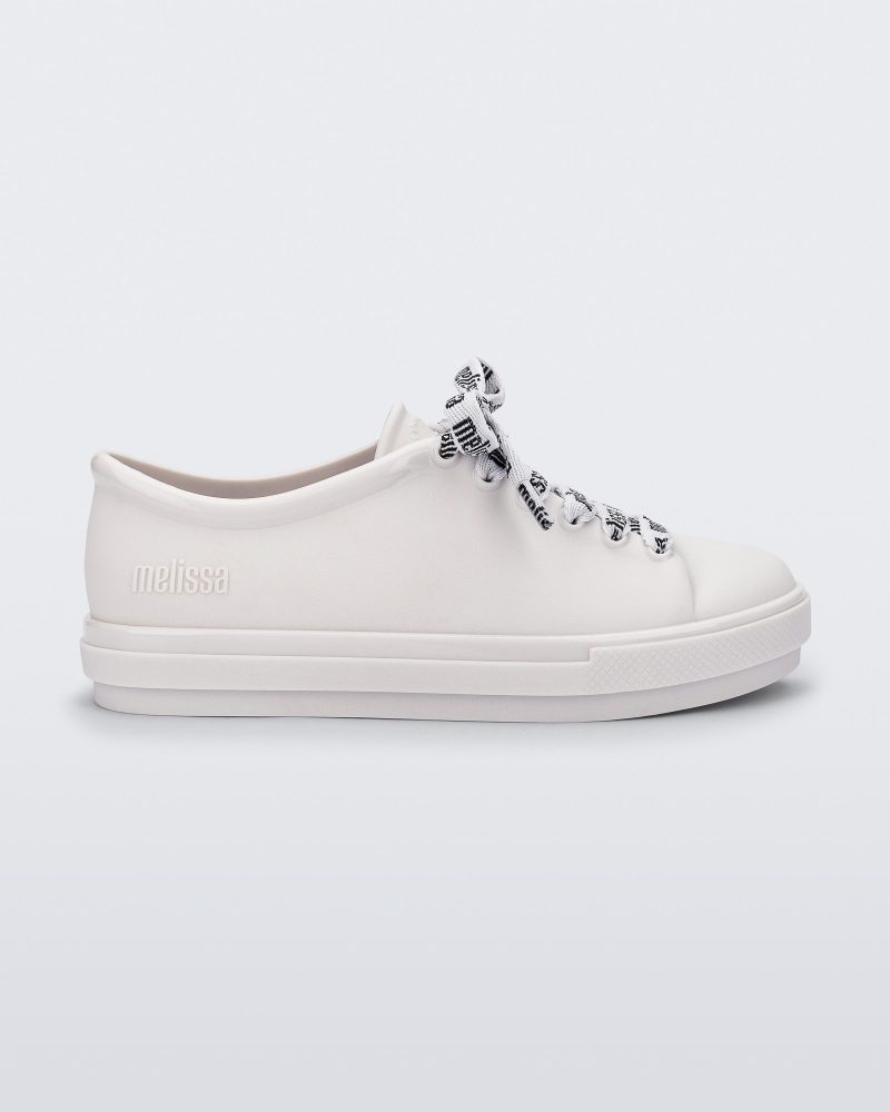 Side view of a white Hip M Lover kids sneaker with laces.