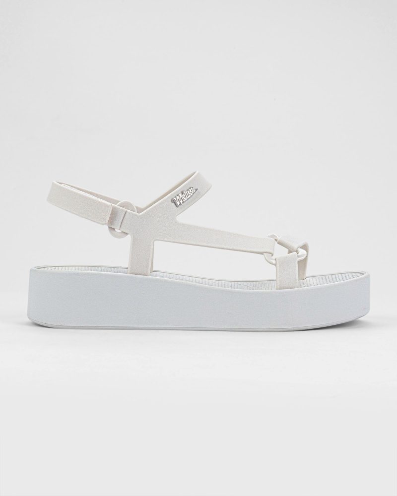 Side view of a white Sun Downtown Platform sandal.