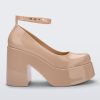 Side view of a beige Melissa Doll Heel platform with ankle strap.