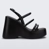 Side view of a black Jessie platform wedge sandal with side buckle ankle strap