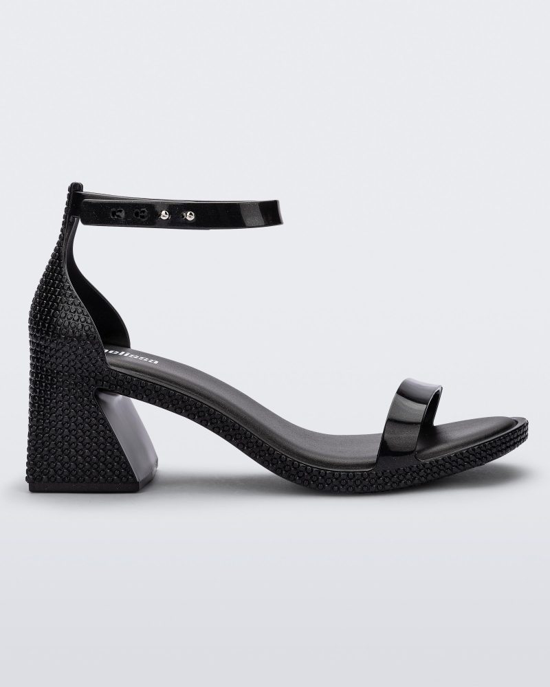 Side view of a metallic black Lux Heel