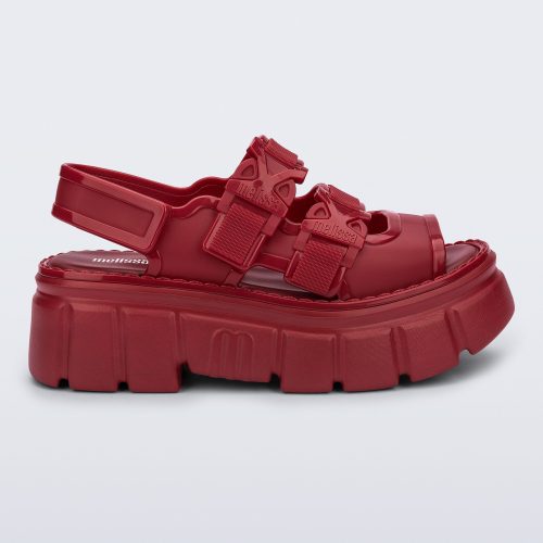 Side view of a red Rebel platform Sandal with back strap