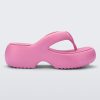 Side view of a pink Free Platform II flip flop