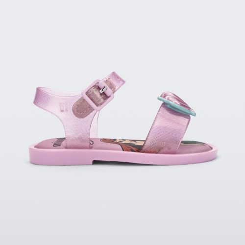 Side view of a glitter pink Mini Melissa Mar Sandal Princess sandal with a seashell detail on the front strap, an ankle strap and Princess Ariel soul