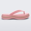 Side view of a pink/beige Melissa Leblon platform flip flop with details that mimic sisal braids on the sole and strap