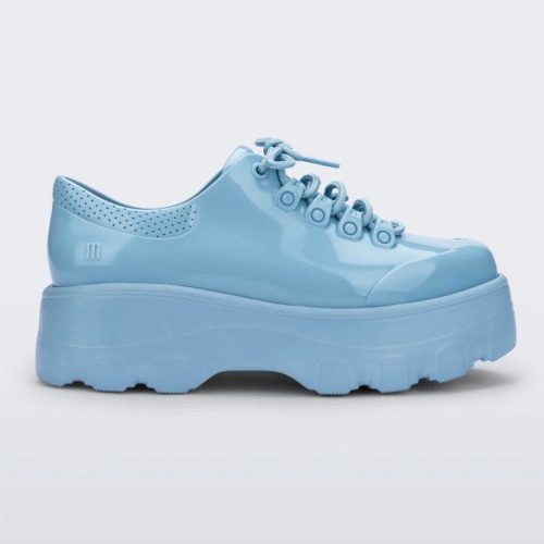 Side view of a blue platform Melissa Kick Off Sneaker with laces.