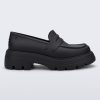 Side view of a matte black Royal adult loafer