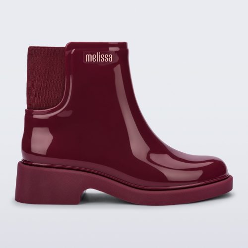 Side view of a burgundy red Chelsea Boot