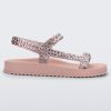 Side view of a pink Lust sandal with rose gold strap