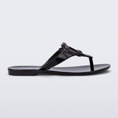 Side view of a black Olivia adult flip flop