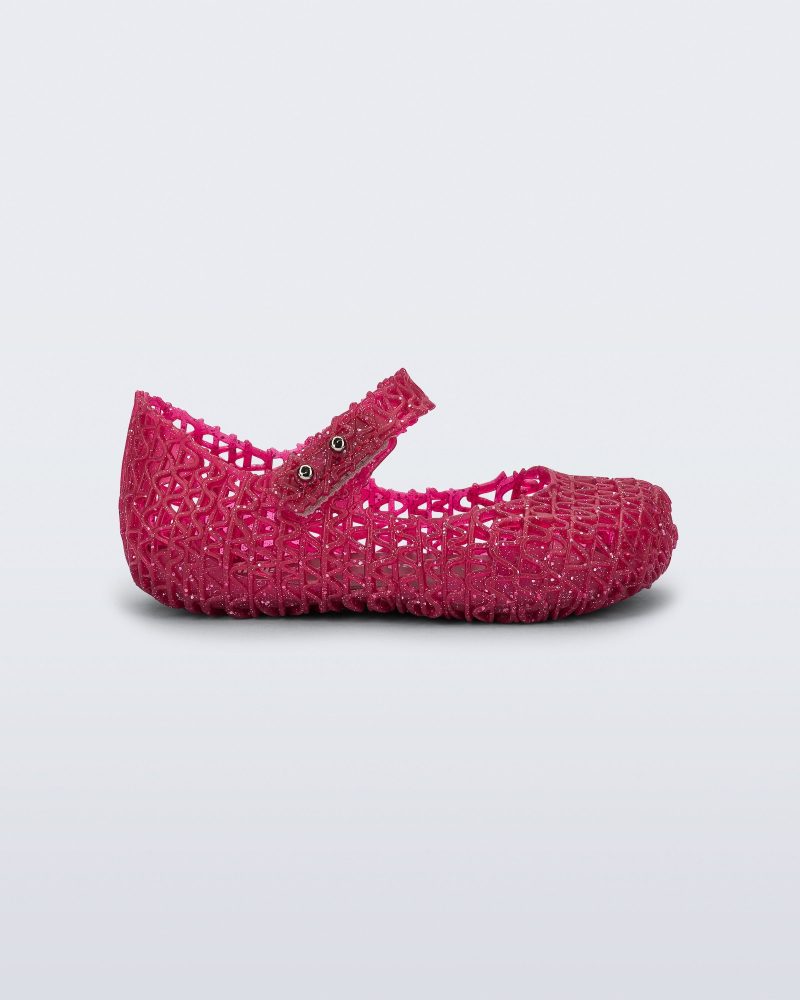 Side view of a glitter red baby Campana ballerina flat