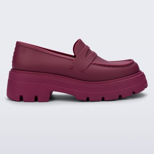 Side view of a matte red Royal adult loafer