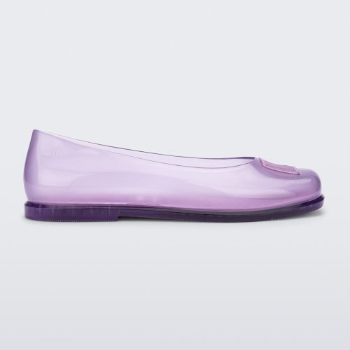 Side view of a lilac Ruby + Marc Jacobs flat