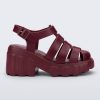 Side view of a red Megan platform fisherman style adult sandal