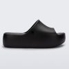 Side view of the black Free Platform women's slide