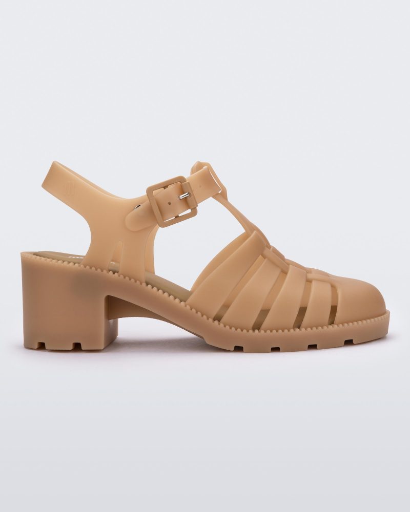 Side view of a beige Possession Heel women's fisherman style sandal.