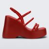 Side view of a red Jessie platform wedge sandal with side buckle ankle strap