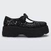 Side view of a black Kick Off Lace women's platform shoe with buckle.