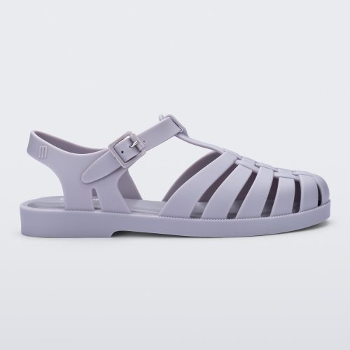 Side view of a grey Possession sandal